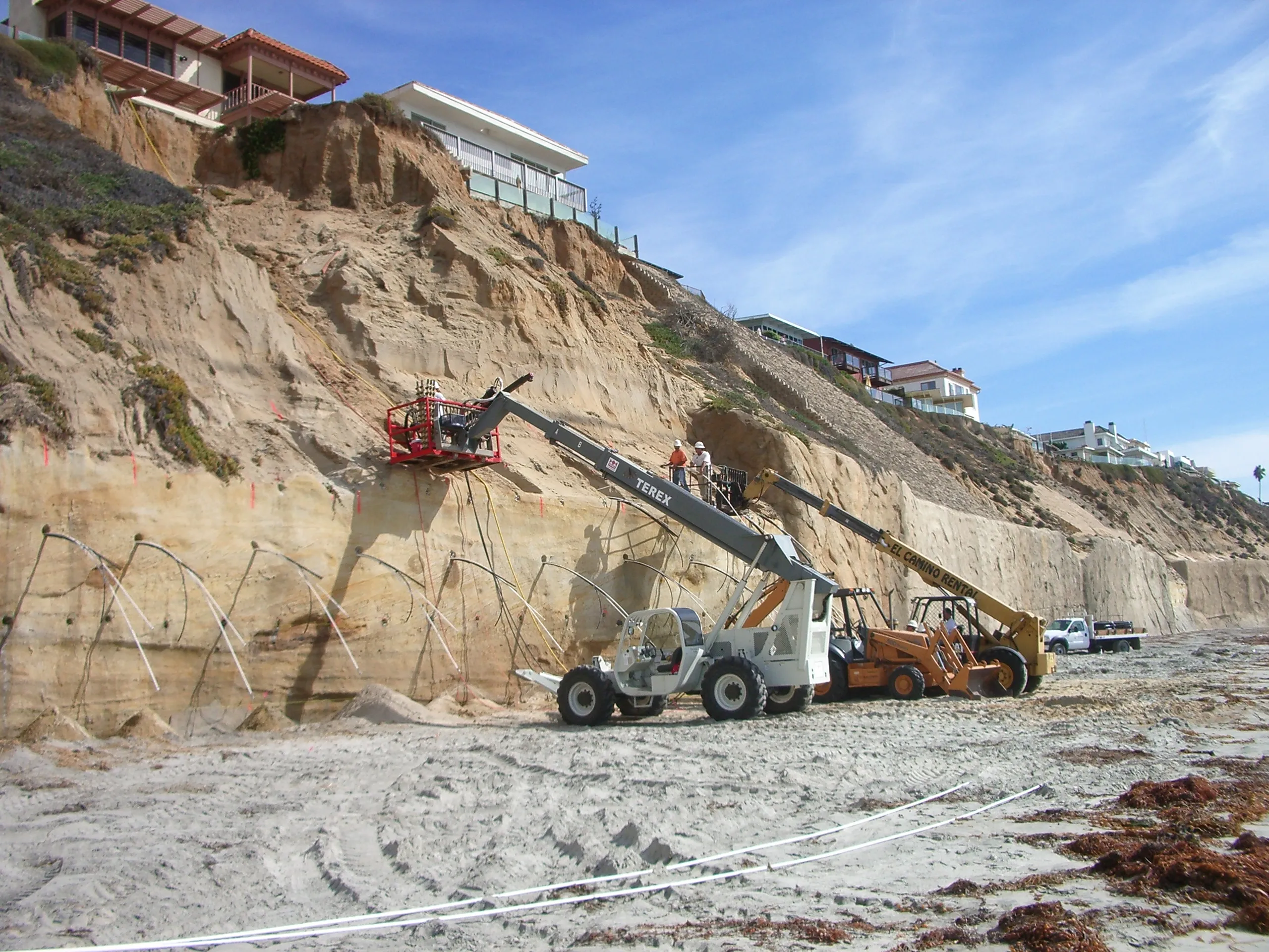 J.C. Baldwin equipment operating along a Southern California coastal bluff
