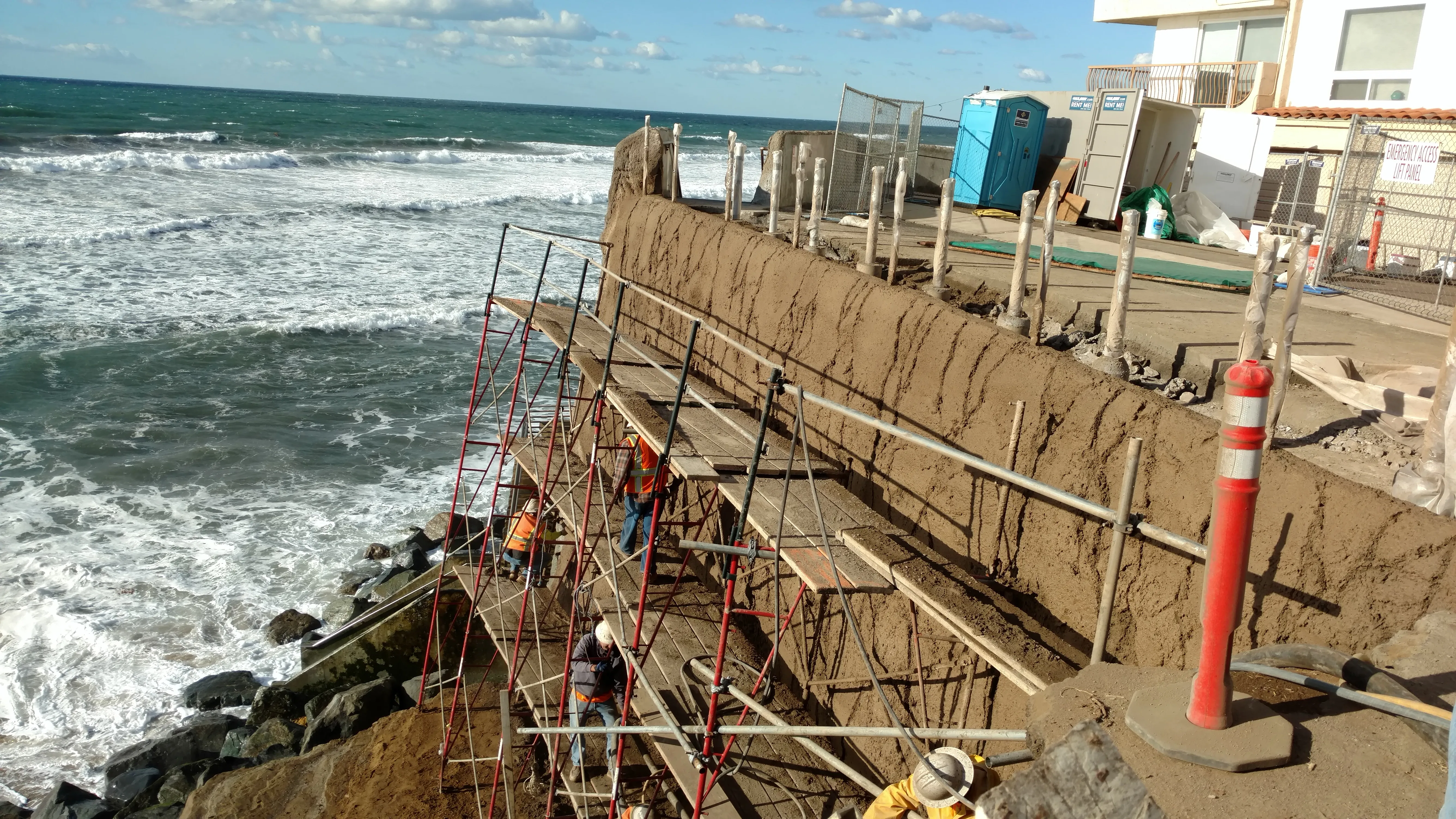 Scaffolding and formwork along an active oceanfront bluff