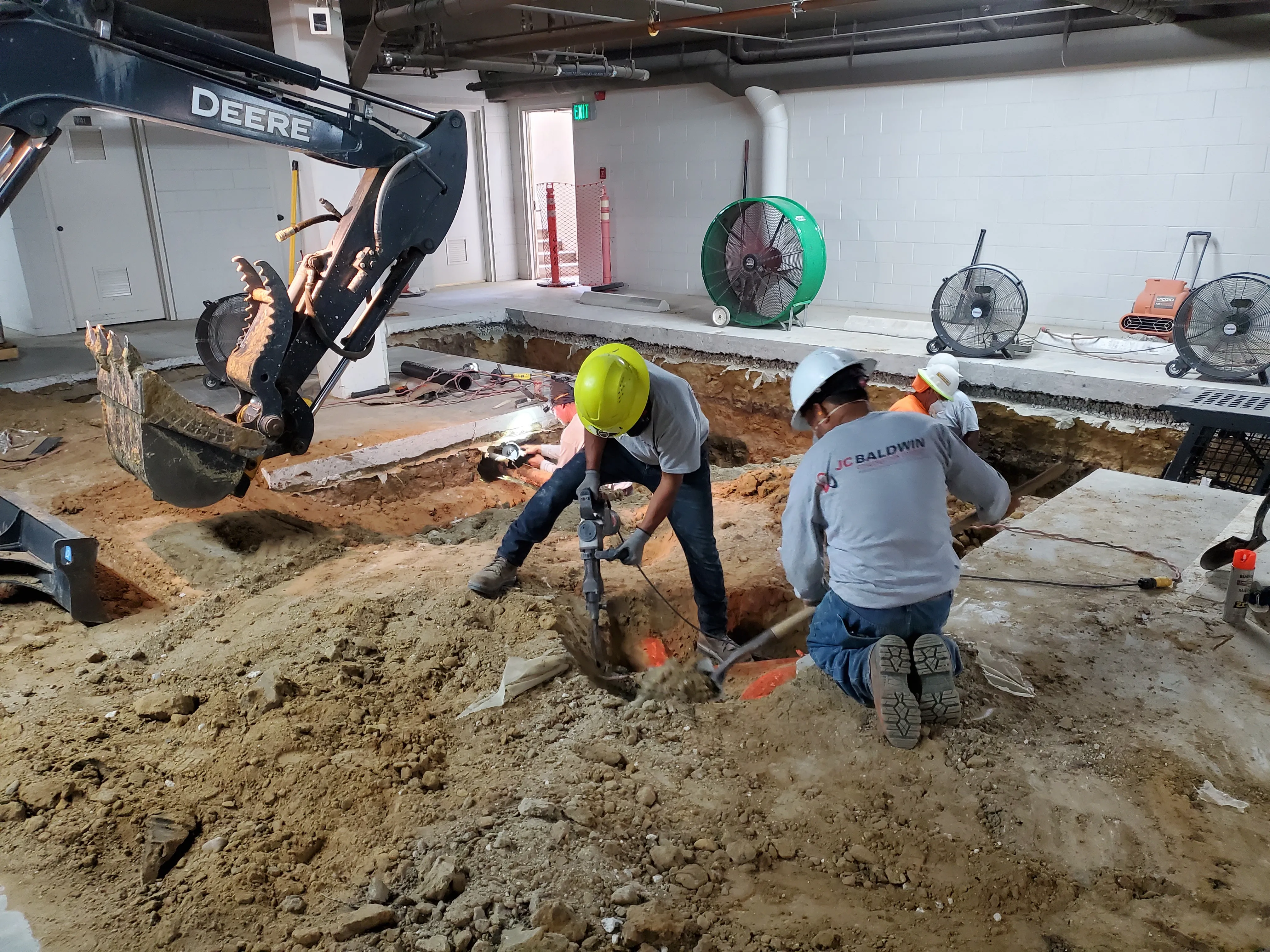 J.C. Baldwin crew performing underpinning work at Century Woods