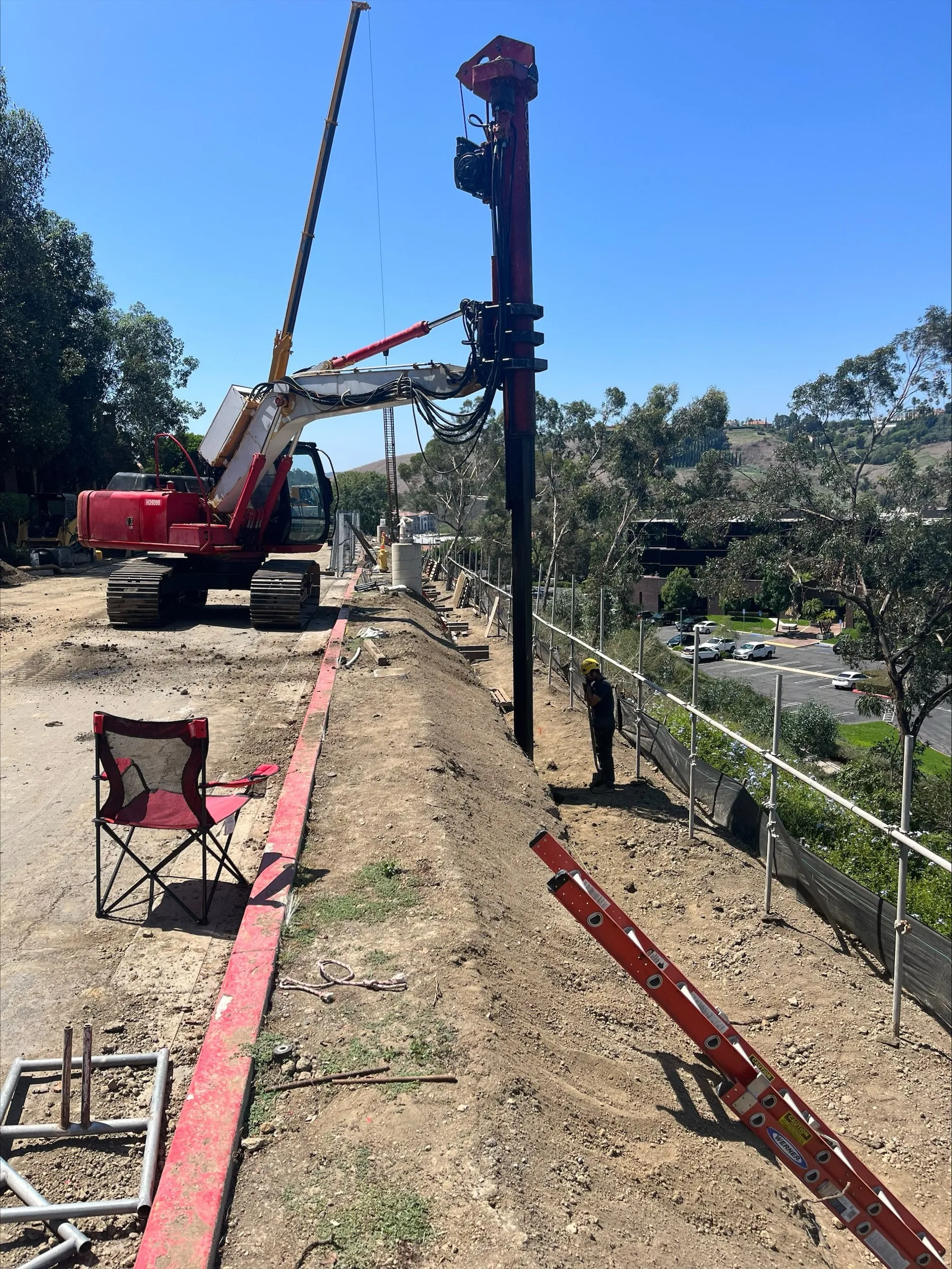 Track-mounted CIDH pile drilling rig along La Alameda at Camden Crown Valley